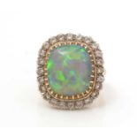 A black opal and diamond cluster ring,