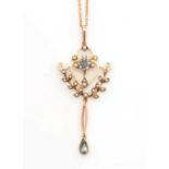 An Edwardian aquamarine and seed pearl pendant,
