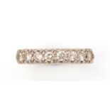 A diamond half hoop eternity ring,