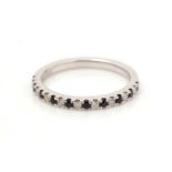 A sapphire and diamond half-hoop eternity ring,