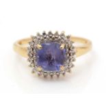 Tanzanite and diamond cluster ring,