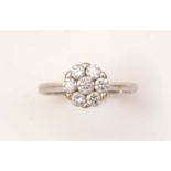 A diamond cluster ring,