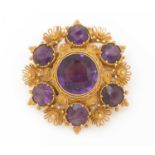 A 19th Century amethyst and yellow metal brooch