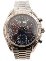 Omega Speedmaster Automatic: a triple calendar steel cased wristwatch,