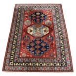 A Tetex rug,