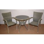 Supremo Leisure rattan style garden table and chairs.