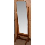 A 20th Century mahogany cheval mirror.