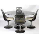 Chromcraft USA; a 1970's smoked glass tulip table, with four swivel dining chairs.