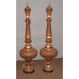 A pair of Indian pierced coppered brass floor standing lamps