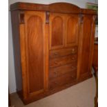 A Victorian mahogany breakfront wardrobe.