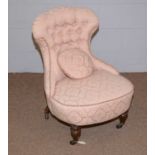 A Victorian pale pink button back occasional chair.