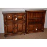 A small reproduction Georgian style oak cupboard, and another.