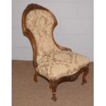 A Victorian walnut spoon back chair.