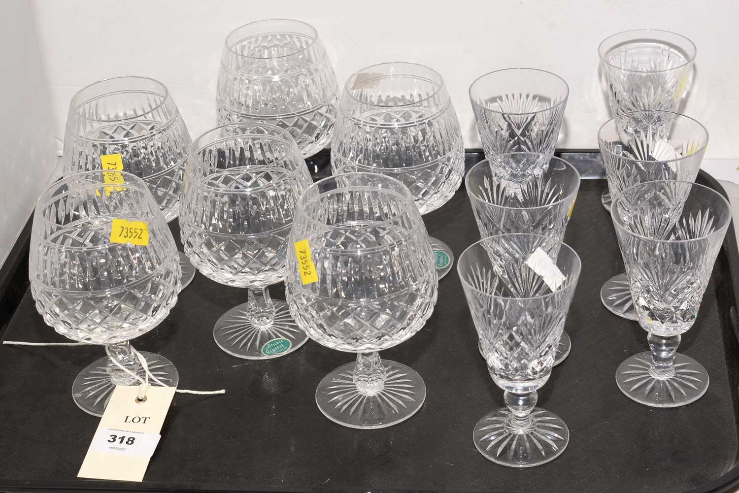 Set of six crystal brandy glasses; and set of six liqueur glasses, various makers.