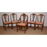 A set of six Georgian style beech and mahogany dining chairs.