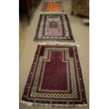 Two Baluch prayer rugs and a Baluch carpet.