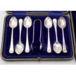 A set of six silver teaspoons and sugar tongs, by Lee & Wigfull, cased; and an empty case.