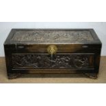 An early 20th Century Chinese carved camphor wood chest,