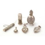 A selection of silver scent bottles,