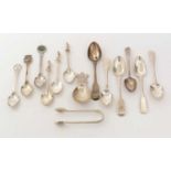 A selection of silver spoons and tongs, and other golfing spoons.