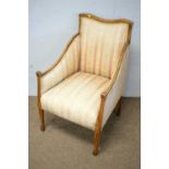 An Edwardian mahogany framed armchair