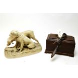 A tea caddy; a letter opener; and a figure group