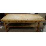 A pine refectory or kitchen table.