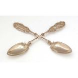 A pair of Continental silver spoons, imported by B Muller & Son,