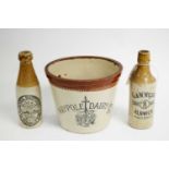 A Maypole Dairy Co. Ltd. stoneware dairy crock; and two others.