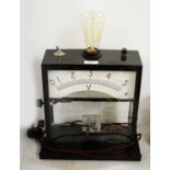 A vintage volt-meter converted to a table lamp.