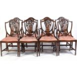 A set of eight Georgian-style mahogany dining chairs.