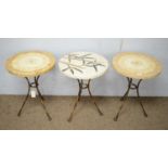 A pair of modern marbled topped occasional tables