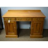A stripped pine small pedestal desk or dressing tabl