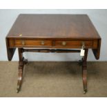 A Regency-style sofa table