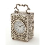 A late Victorian silver dressing table clock, by Charles Henry Dumenil