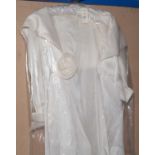 An ivory Caroline Castidliano London pure silk wedding cape.