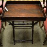 A mahogany butler's tray on stand