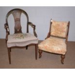 A Georgian style mahogany elbow chair, and another.