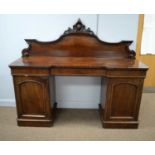 A Victorian mahogany pedestal sideboard