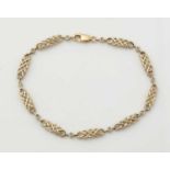 A 9ct yellow gold and diamond bracelet,