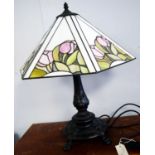 A Tiffany-style table lamp