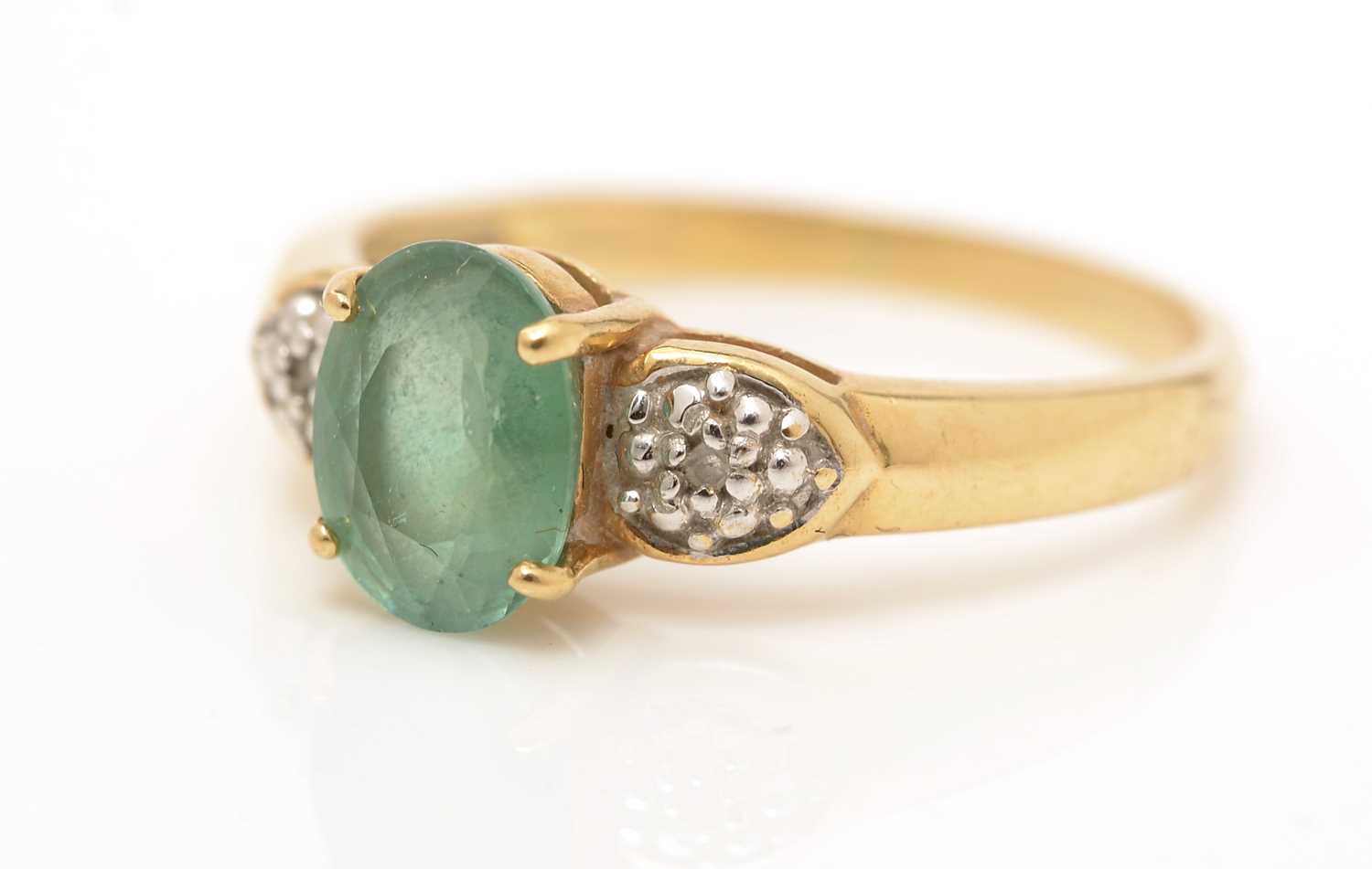 A green apatite and diamond ring,