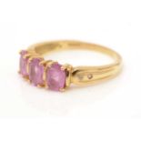 A pink sapphire and diamond ring,