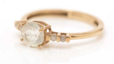 A rock crystal and diamond ring,