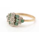 An emerald and diamond ring,