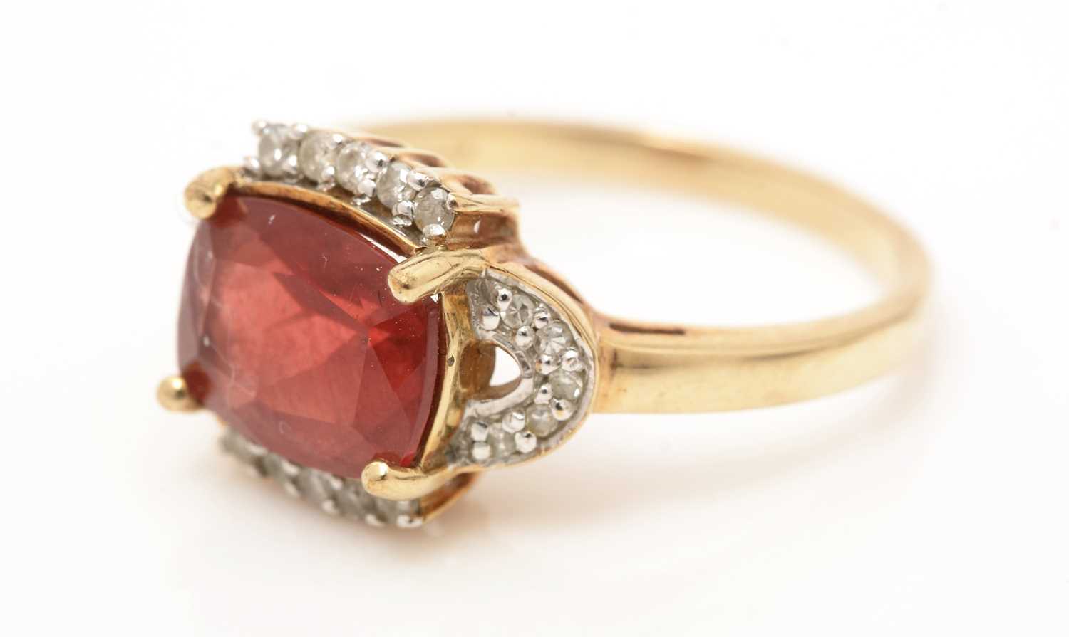 A garnet and diamond ring,