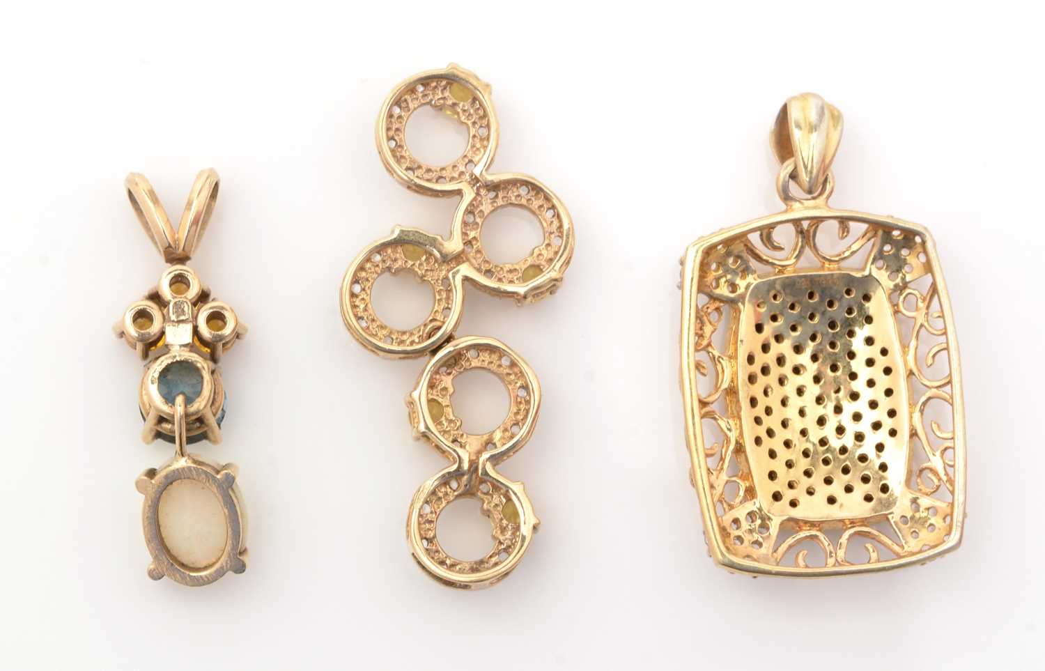 Three gemset pendants, one with opal, topaz and orange sapphires, one yellow and white stones, the - Image 2 of 2