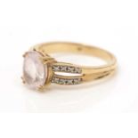 A kunzite and diamond ring,