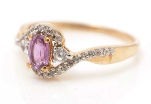 A pink sapphire and diamond ring,