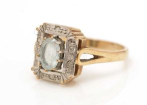 An aquamarine and diamond ring,